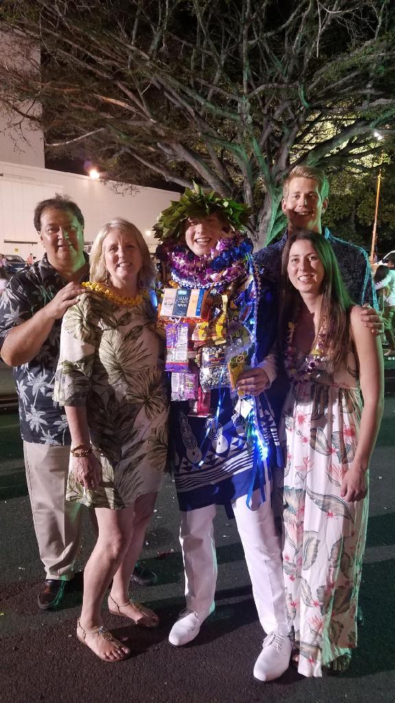 The Gates family celebrating Evan's graduation from Kamehameha Schools